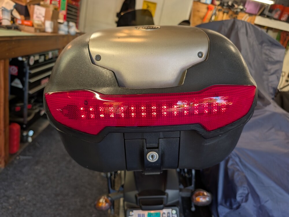 Completed Buell top case with the integrated LED lamp illuminated