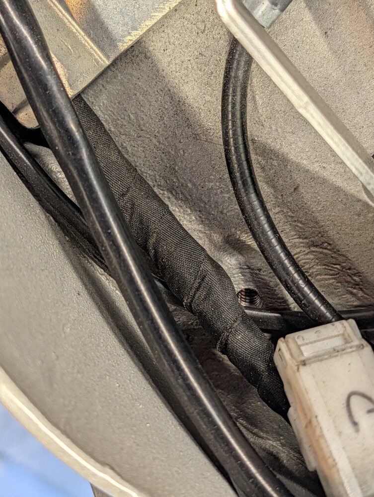 Wrapped motorcycle-side lighting loom containing the resistor and diodes before the connector
